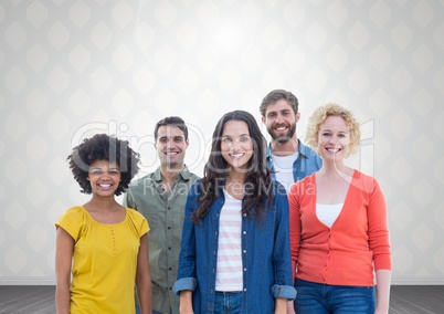 Group of people standing in front of bright grey background