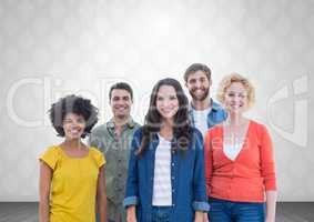 Group of people standing in front of bright grey background