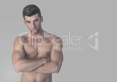Portrait of fit and strong Man with grey background