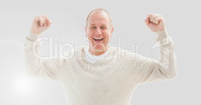 Portrait of Man celebrating with grey background