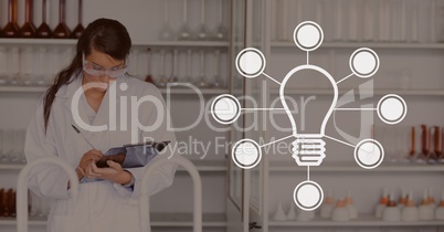 Bulb icon against woman at the laboratory photo