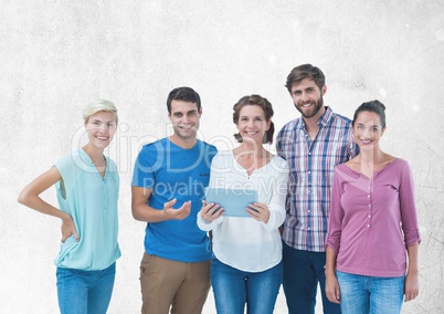 Group of people standing in front of blank grey background