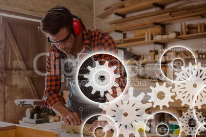 Gears icons against man working photo