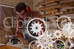 Gears icons against man working photo
