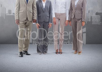 Group of business people standing in front of blank grey background with cityscape