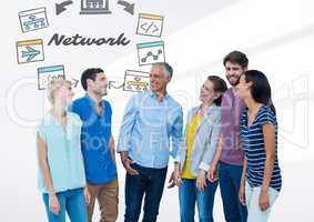 Group of people standing in front of Network graphics