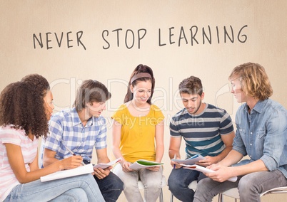 Group of students sitting in front of Never Stop Learning text