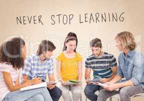 Group of students sitting in front of Never Stop Learning text