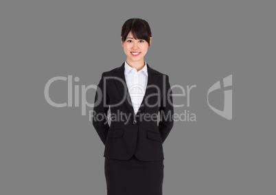Portrait of businesswoman with grey background