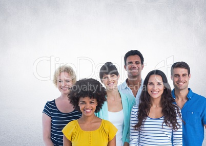 Group of people standing in front of blank grey background