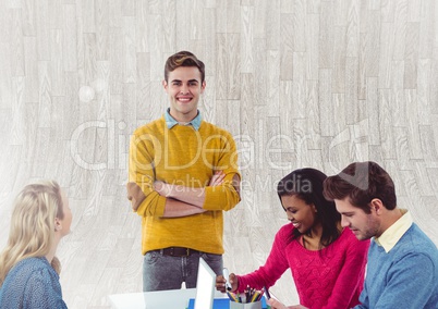 Group of people working in front of wooden background