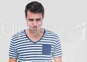 Portrait of Man feeling sick like vomiting with grey background