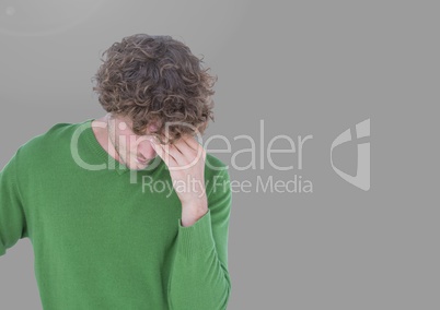 Portrait of thinking stressed Man with grey background