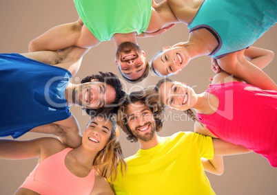 Low angle of millennials in circle against brown background with flare