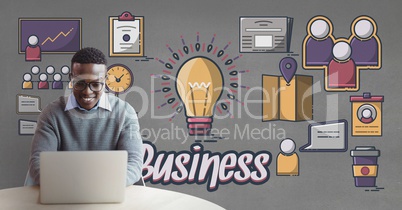 Happy business man at a desk using a computer against grey background with graphics