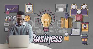Happy business man at a desk using a computer against grey background with graphics