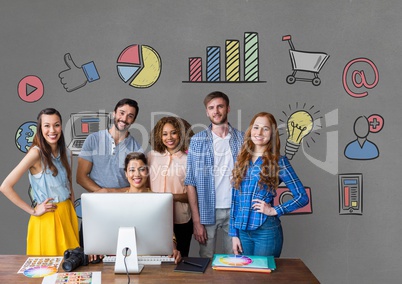 Happy business people at a desk standing against grey background with graphics Happy business people at a desk standing against grey background with graphics