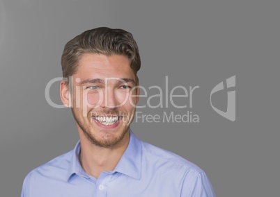 Portrait of Man laughing with grey background