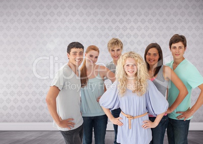 Group of young adults standing in front of bright wallpaper background
