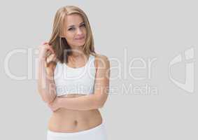 Portrait of beautiful fit  sporty woman with grey background