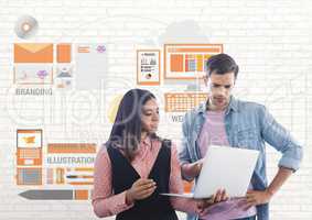 Happy business people using a computer against white wall with graphics