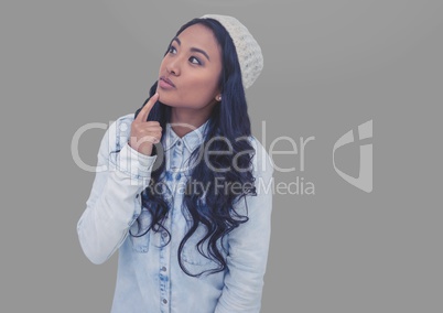 Portrait of woman curious with grey background