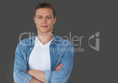 Portrait of Man with arms folded and grey background