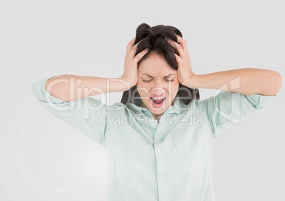 Portrait of stressed tense woman with grey background