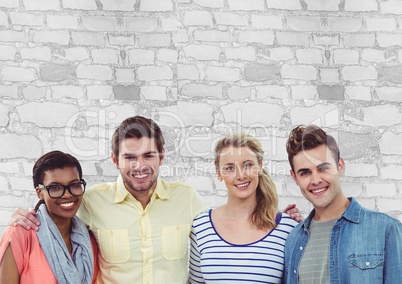 Group of people standing in front of bright brick wall