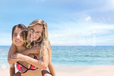 Happy couple at the beach embracing