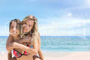 Happy couple at the beach embracing