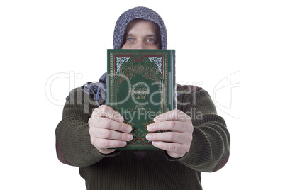 Muslim man with the Koran in their hands