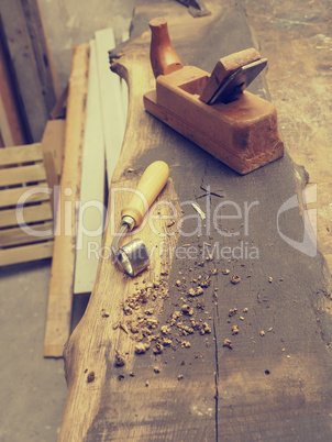 Carpenter tools on a wooden workbench