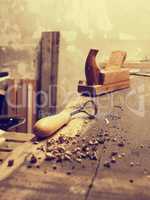Carpenter tools on a wooden workbench