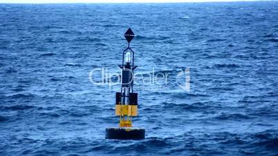 Buoy in the middle of the sea