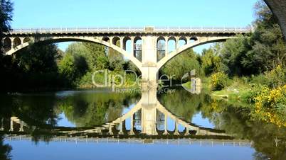 Bridge reflected in a river