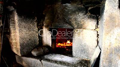 Stone oven heating up, preparing to bake bread