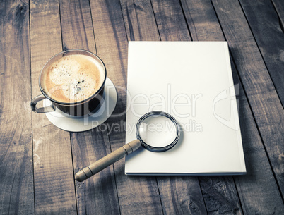 Booklet, magnifier, coffee cup