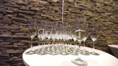 Champagne in wineglass, in a restaurant, Restaurant interior, buffet table, close-up