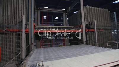 Automated line for the production of ceramic tiles, a complete cycle of production of tiles from clay to the finished product in a single factory