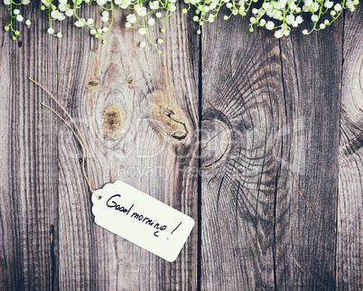 Gray wood background with paper tag