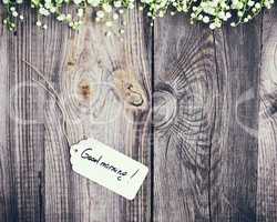 Gray wood background with paper tag