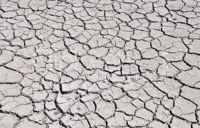 cracked by drought the ground, view from above