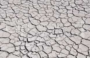 cracked by drought the ground, view from above