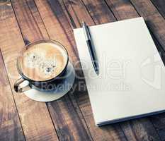 Book, pencil, coffee cup