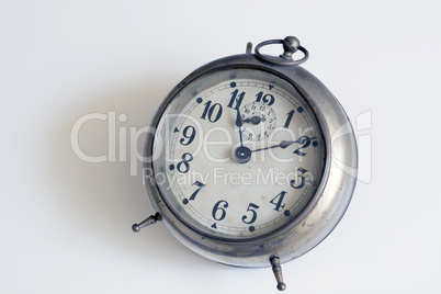 old clock on a white background