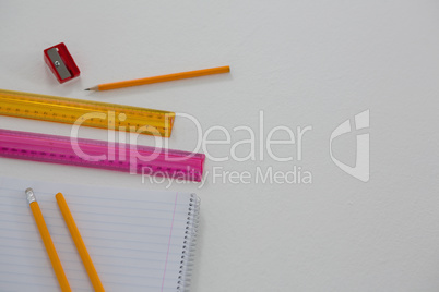 Various school supplies on white background