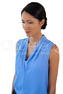 Contemplated businesswoman woman looking down