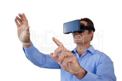 Businessman gesturing while wearing virtual reality simulator