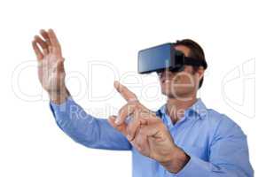 Businessman gesturing while wearing virtual reality simulator